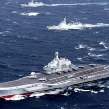 China flanks Taiwan with military exercises in air and sea
