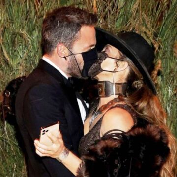 Jennifer Lopez and Ben Affleck share a masked kiss at Met Gala