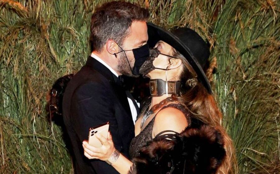 Jennifer Lopez and Ben Affleck share a masked kiss at Met Gala